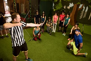 Archery Games referee teaching a group